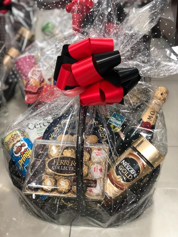 Wrapped executive basket with champagne and chocolates