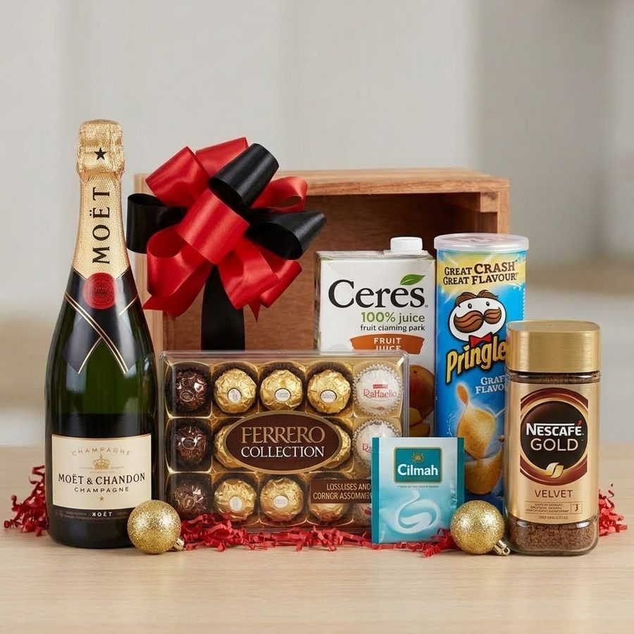 Wooden crate hamper with champagne, chocolates, juice, crisps and coffee