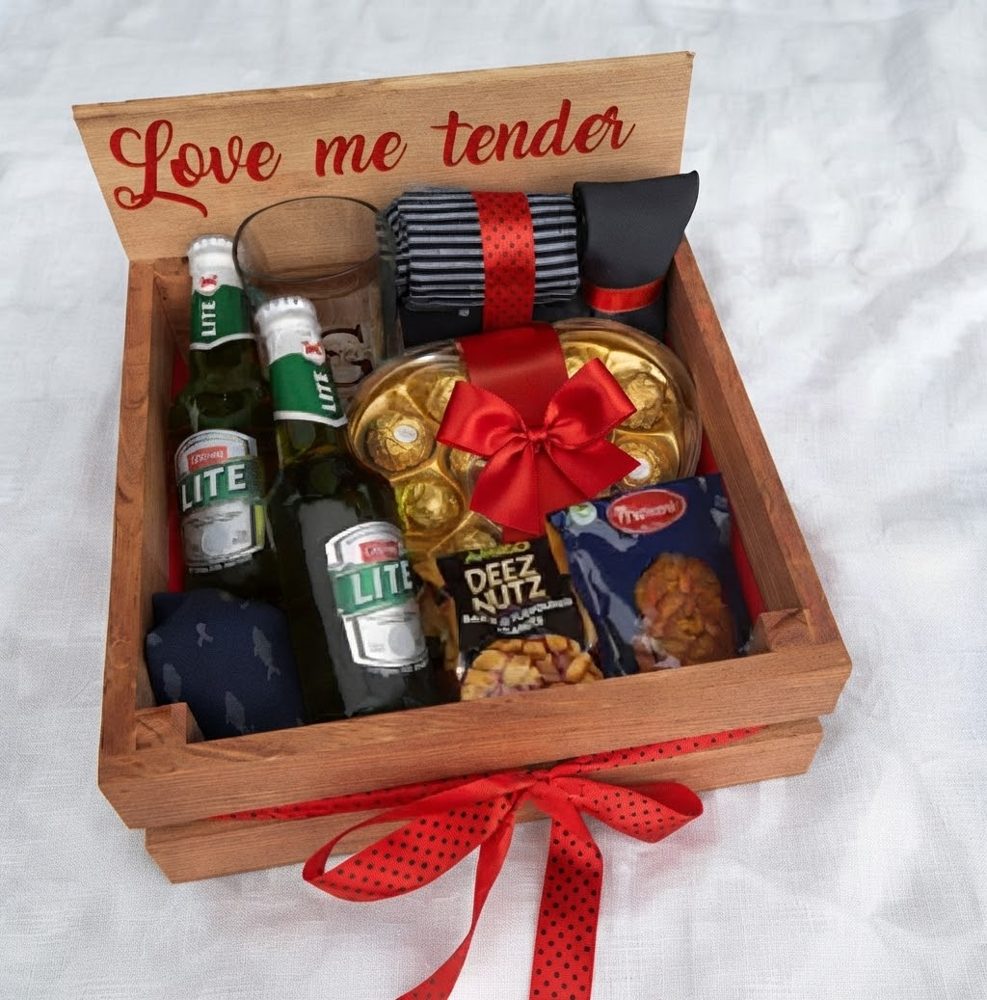 Wooden crate engraved Love me tender with Lite beers, glass, socks, tie, Ferrero hearts and nuts